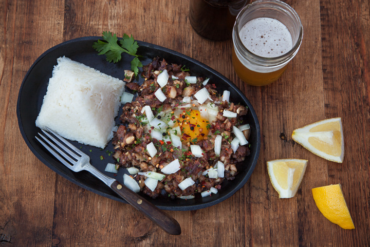 7 Mile House serves Sisig, a Filipino fatty meat dish with rice.