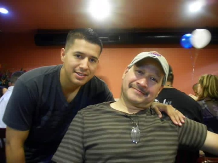 This photo provided by Maria Zamarripa shows Patrick Zamarripa and his father, Rick Zamarripa. Patrick Zamarripa was one of five police officer shot dead in Dallas by a sniper on Thursday, July 7, 2016.