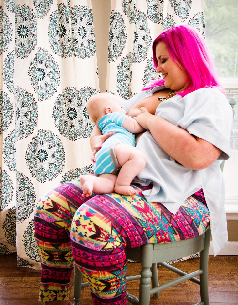 Breastfeeding mom poses for photos before cancer treatment