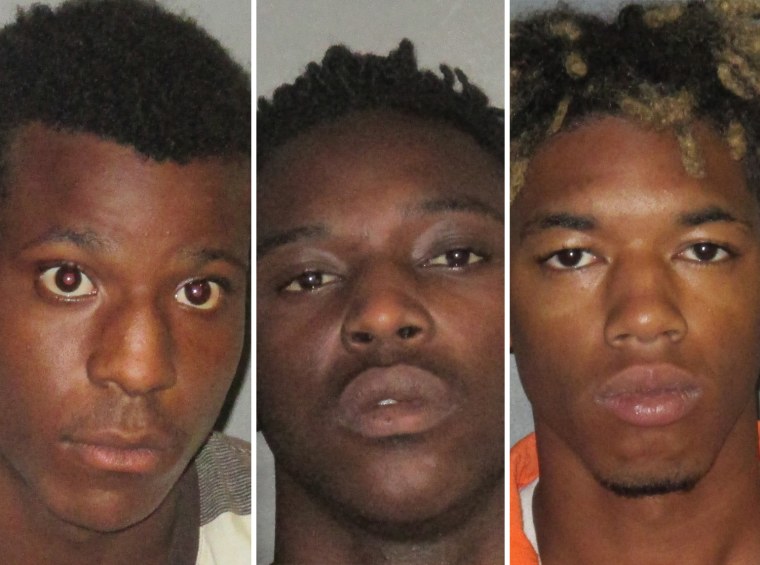 From left, Antonio Thomas, 17, Trashone Coats, 23, and Malik Bridgewater, 20.