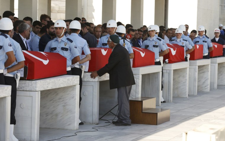 Image: Soldiers guard coffins of victims of the thwarted coup in Ankara