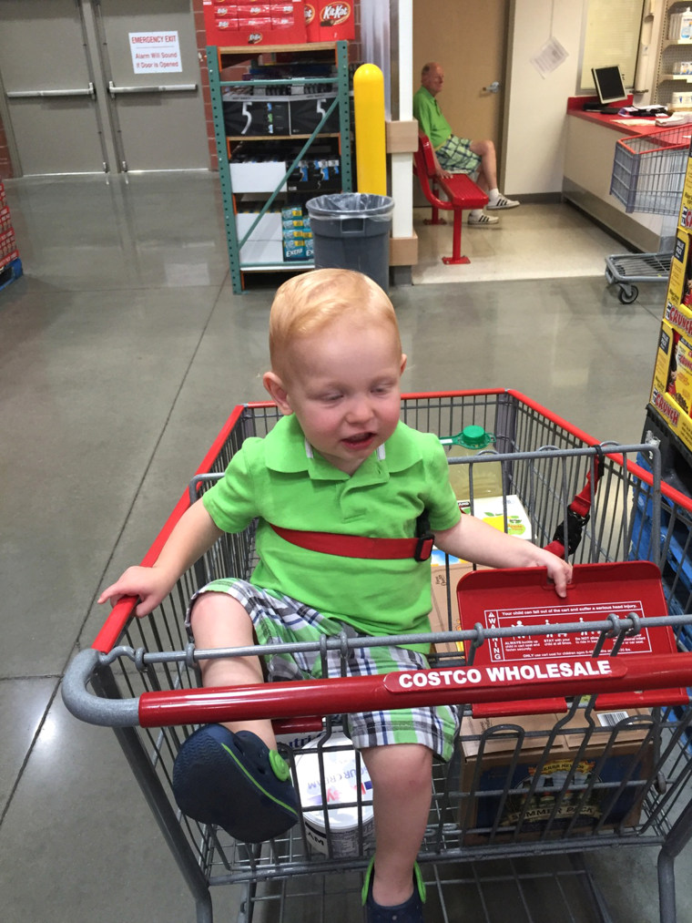 baby on shopping cart