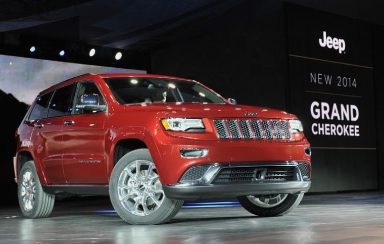 The 2014 Jeep Grand Cherokee is introduced at the North American International Auto Show in Detroit