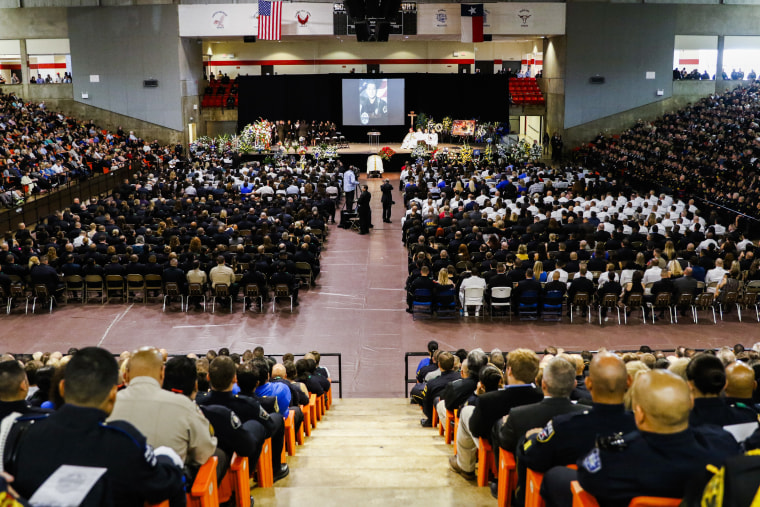 Image: Mourners attend the funeral service for Dallas police officer Patrick Zamarripa