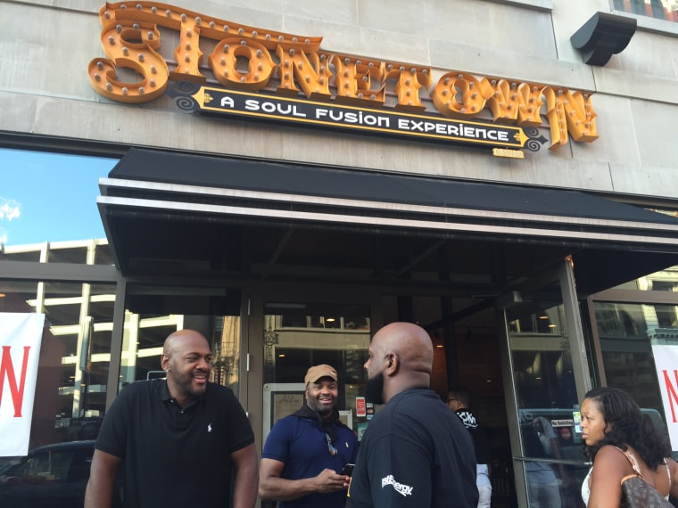Patrons gather outside Stonetown, a soul food restaurant in Cleveland.