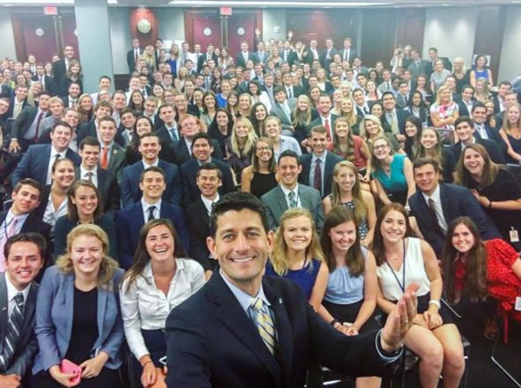 House Speaker Paul Ryan poses with Republican interns.