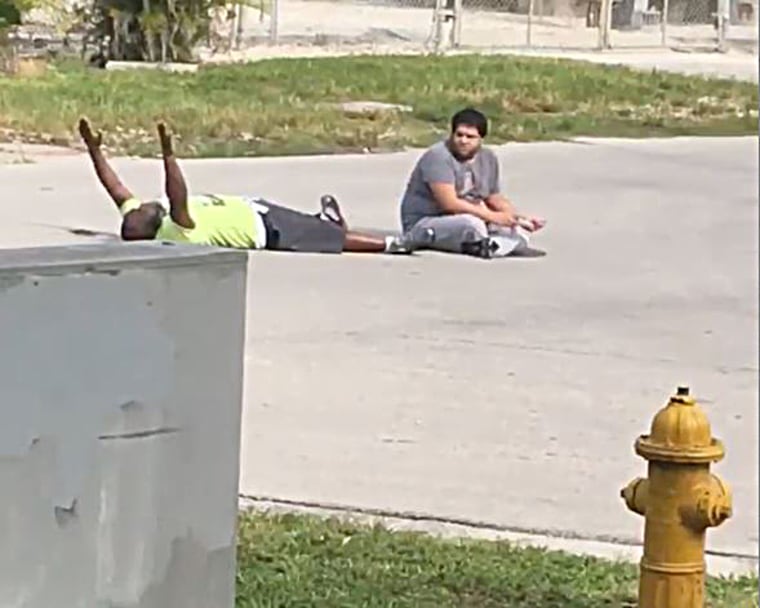 This cell phone video shows the moments before a South Florida caregiver was shot by a North Miami Police officer as he was trying to calm an autistic patient. Charles Kinsey was hospitalized with a gunshot wound to his leg.