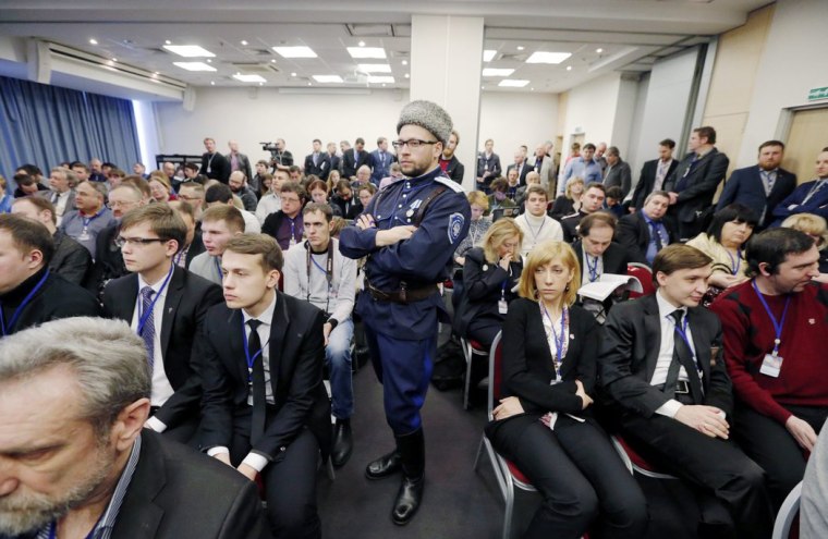 Image: Delegates listen to speeches during the 'International Russian Conservative Forum' in St. Petersburg