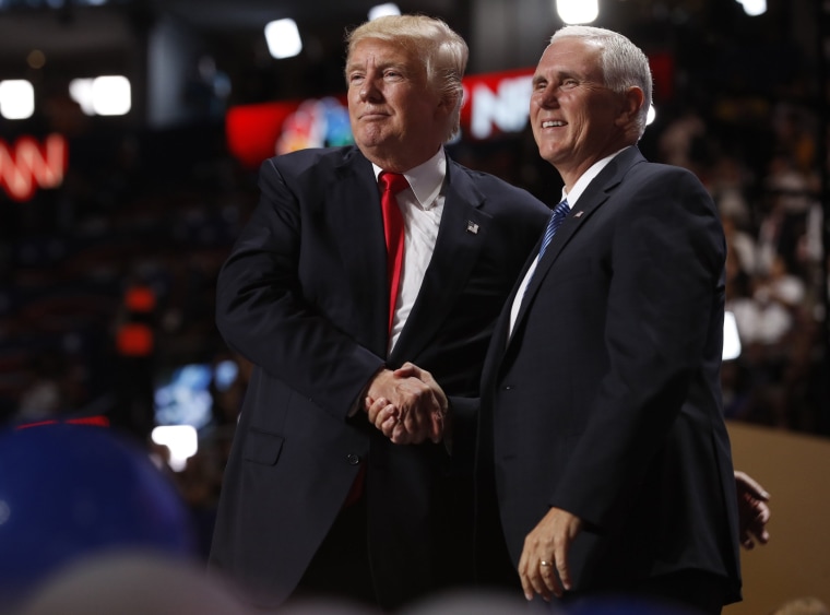 Image: Republican U.S. presidential nominee Trump shakes hands with his running mate Pence at the conclusion of the final session of the Republican National Convention in Cleveland
