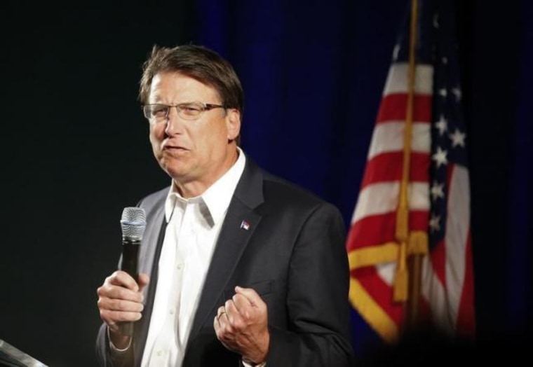 Governor of North Carolina Pat McCrory introduces candidate for U.S. Senate Thom Tillis at a campaign stop in Raleigh