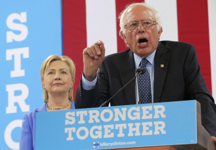 Image: U.S. Senator Sanders endorses Democratic U.S. presidential candidate Clinton during campaign rally in Portsmouth, New Hampshire