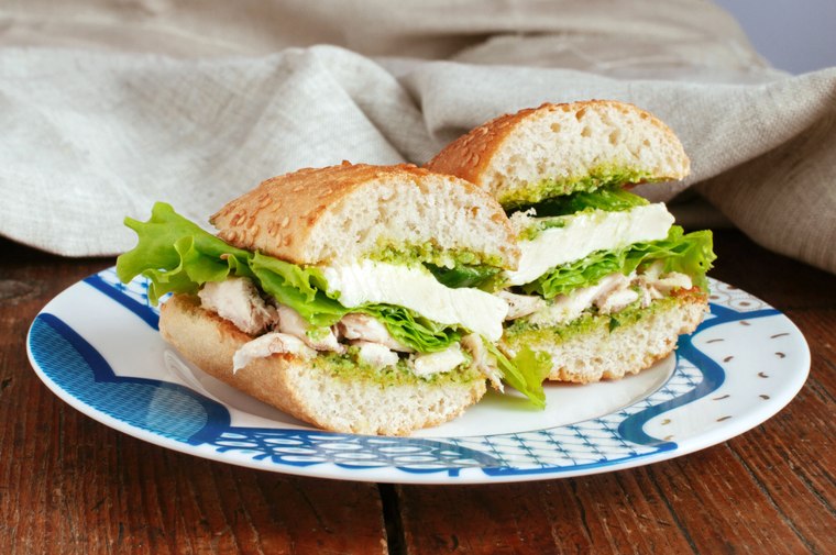 Sandwich with pesto, chicken and mozzarella cheese