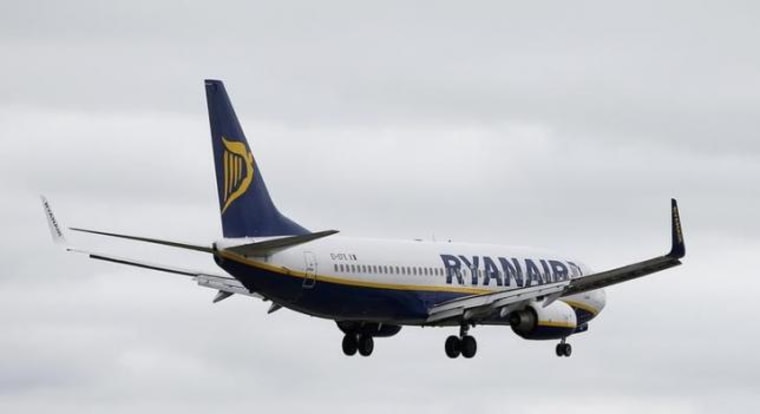 A Ryanair aircraft lands at Manchester Airport in Manchester, north-west England