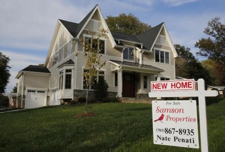 A real estate sign advertising a new home for sale is pictured in Vienna, Virginia