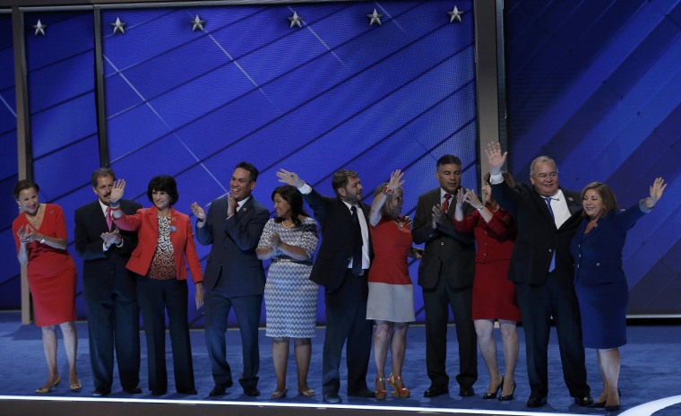 Image: Members of the Congressional Hispanic Caucus stand ontage at the Democratic National Convention in Philadelphia