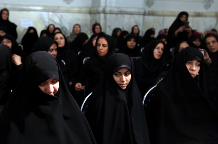 Image:  Iranian women attend a meeting on Feb. 23