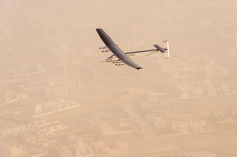 Image: A view of the Solar Impulse 2 on flight after taking off from Al Bateen Airport in United Arab Emirates
