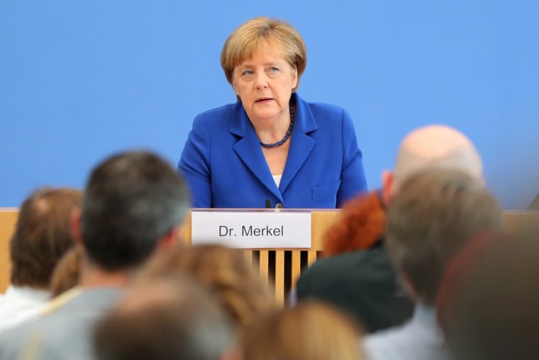 Image: German Chancellor Angela Merkel press conference