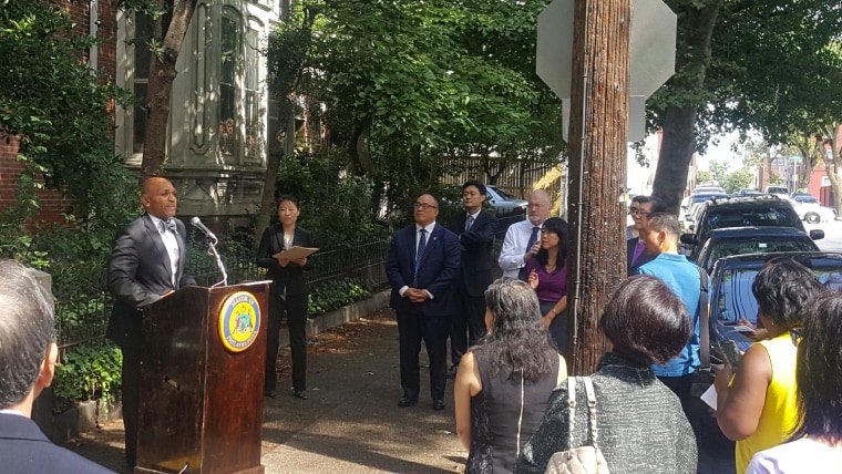 Pastor Jay Broadnax, president of the Black Clergy of Philadelphia and Vicinity, speaking at the dedication in Ih-Ho Oh Memorial Way.