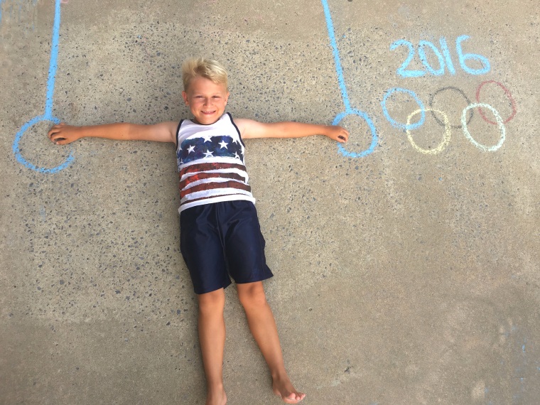 Create this Olympic action shot with sidewalk chalk and your future Olympian.