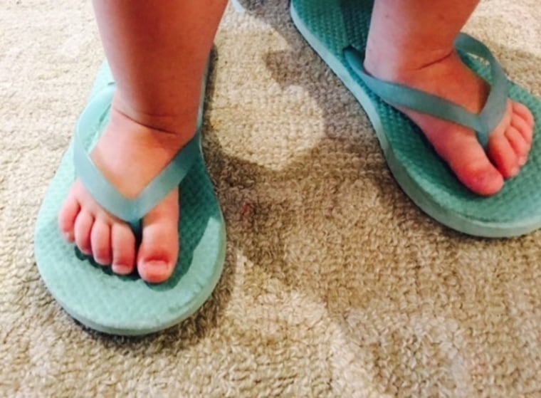 Tiny feet in flip-flops