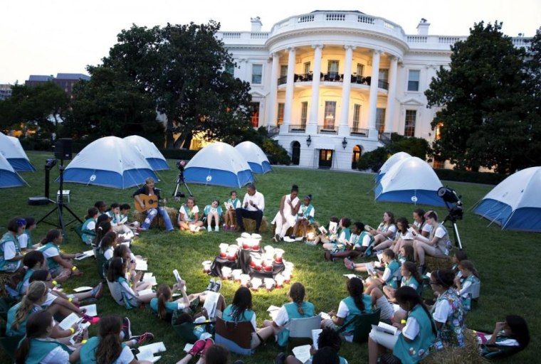 Obama and first lady join Girl Scouts for singalong during camp-out on South Lawn of White House in Washington