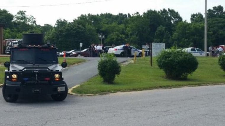 Police at the scene of Monday's standoff.