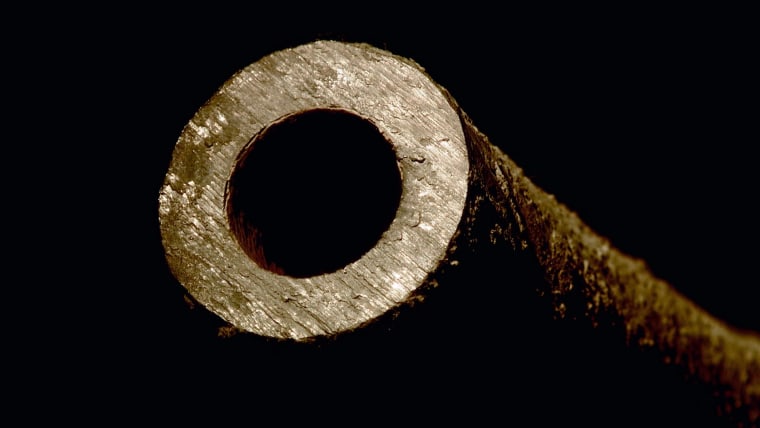 A close-up of a lead pipe pulled from underneath a New Orleans’ sidewalk. Lead was once widely used in a variety of industries, including paint and plumbing. Public health experts and agencies like the CDC now agree that there is no safe level of lead exposure for children. Lead service lines like this one can leach lead if exposed to corrosive water.