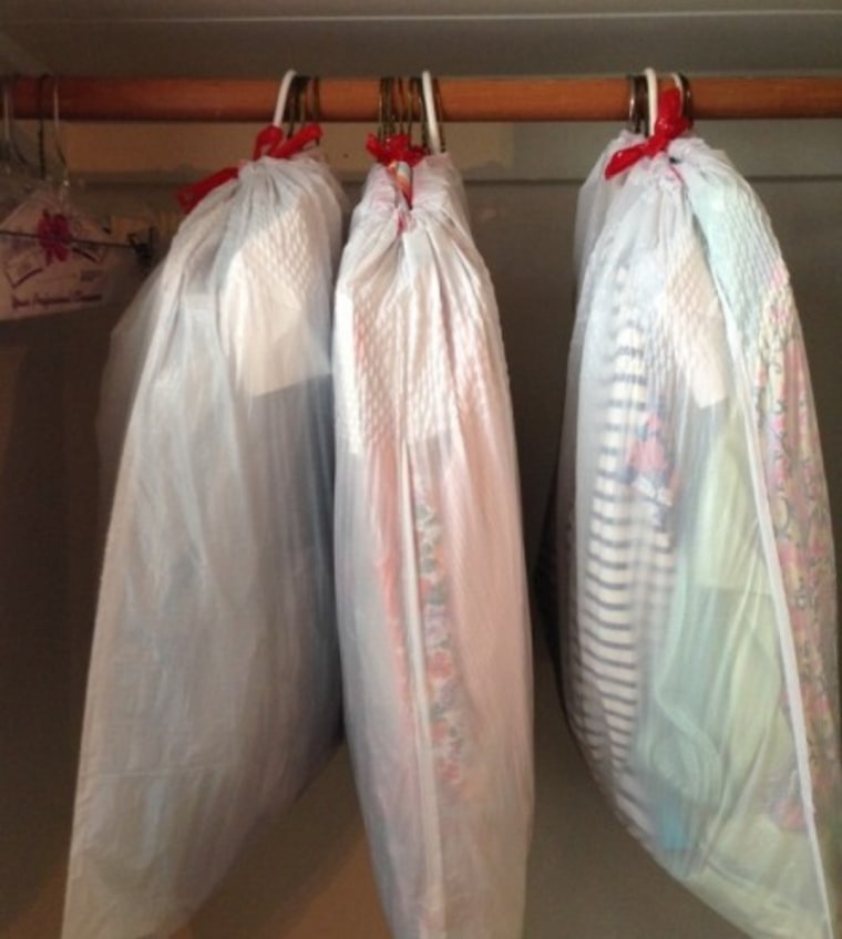White trash bags can be used to pack clothing.