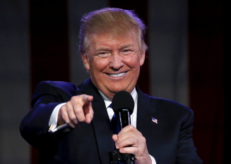 Image: U.S. Republican presidential candidate Donald Trump smiles during the Suffolk County Republican Committee fundraising reception in Patchogue, New York