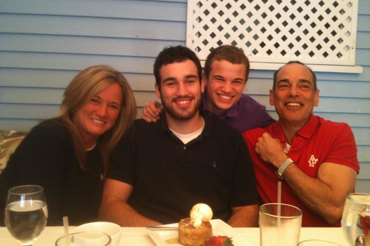 Taylor Stewart (black polo shirt) and his family.