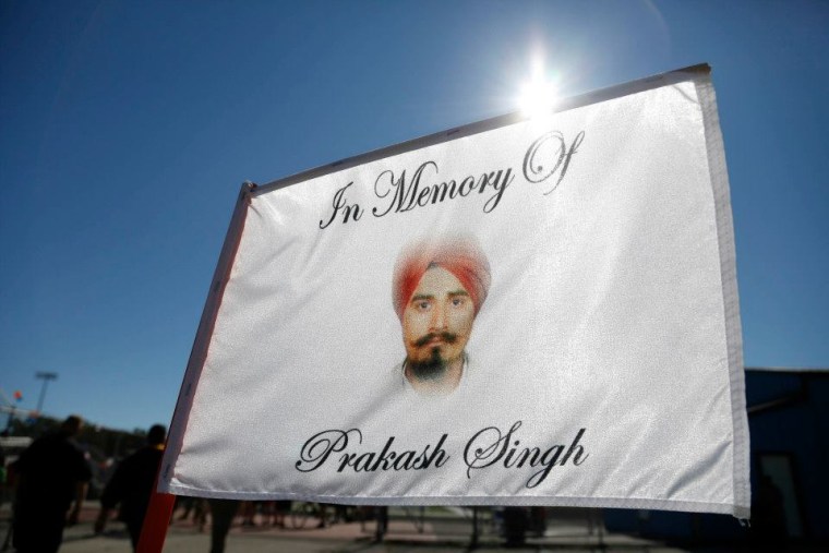 A memorial banner at the Chardi Kala 6k.