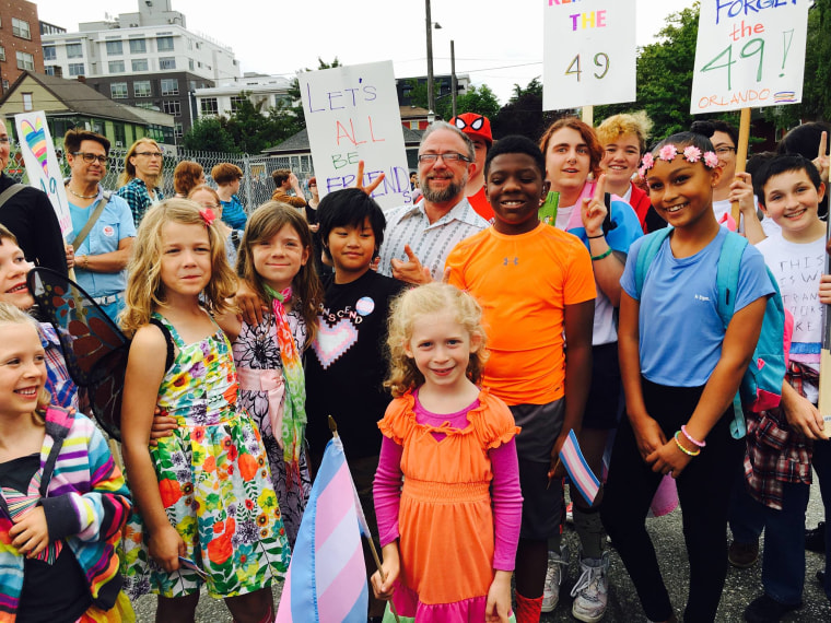 Aidan Key and children celebrating Trans Pride 2016.