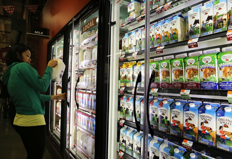 Image: Milk is displayed on shelves in a Brooklyn supermarket on June 9 in New York City. Milk prices for Americans have been on the rise recently with a 7.5% price increase for a gallon of fortified whole milk from last year.