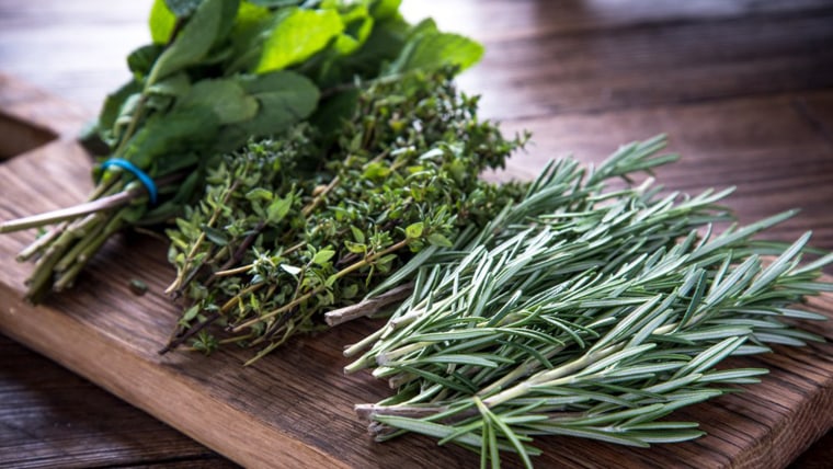 Image: garden fresh herbs on wooden board