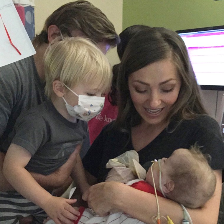 The Frandsen family pic: Demi, husband Jeff, toddler brother Sawyer.