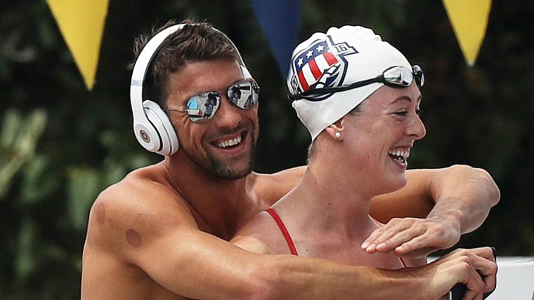 Michael Phelps hugs Allison Schmitt