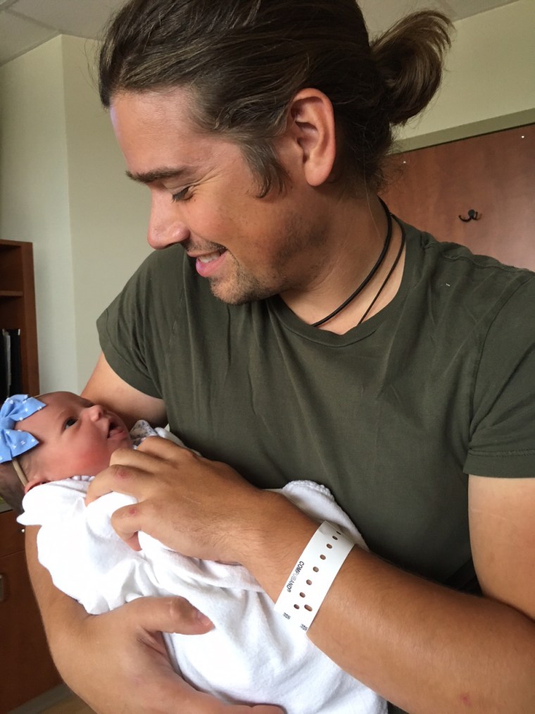 Zac Hanson with his new baby girl