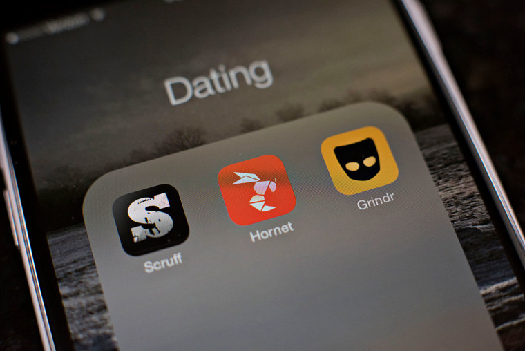 Gay dating apps Scruff, Hornet, and Grindr are displayed on an Apple iPhone