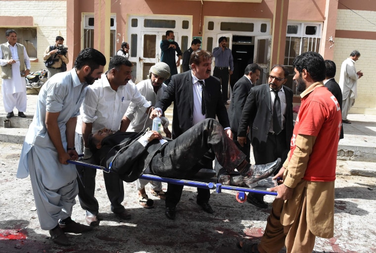 Image: Patient on stretcher after bombing at hospital in Quetta, Pakistan