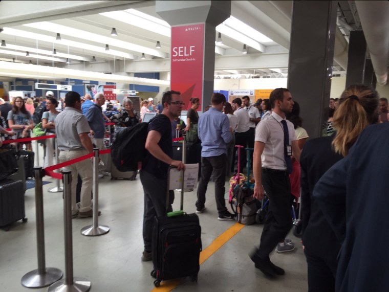 Image: U.S.-bound Delta passengers at Rome's Fiumicino Airport waited more than an hour in line to check-in early Monday.