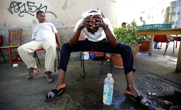 Thousands of Migrants Flock to Rome's Gloomy Street