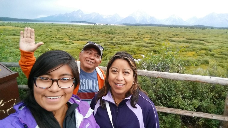 Image: Millie Jimenez poses for a selfie with her parents in the summer of 2015