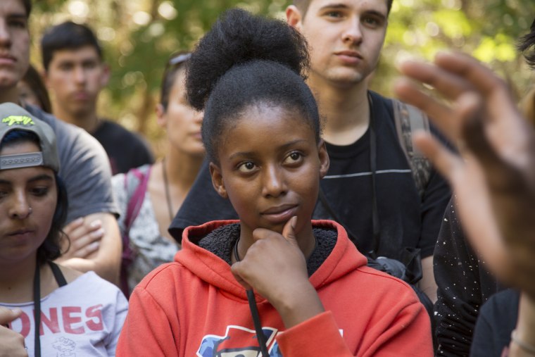 Image: A student listens to Ranger Shelton Johnson welcome them into Yosemite National Park.