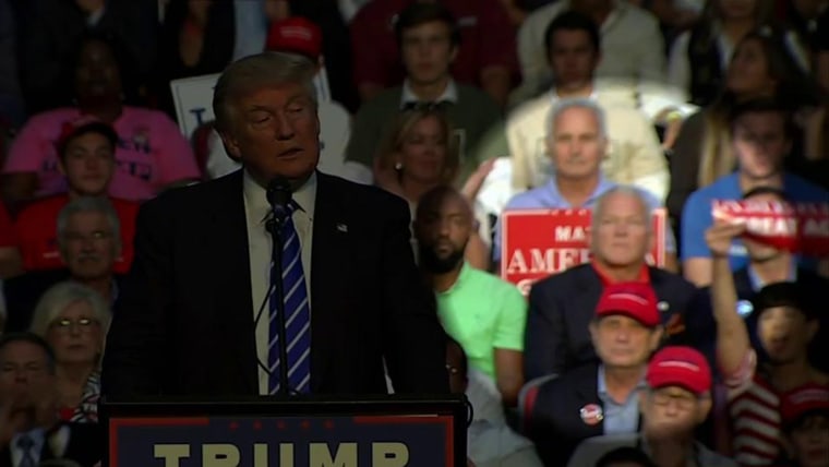 Republican presidential candidate Donald Trump speaks during a campaign rally on Wednesday, Aug. 10, 2016, in Sunrise, Fla. -- with disgraced former Congressman Mark Foley highlighted.