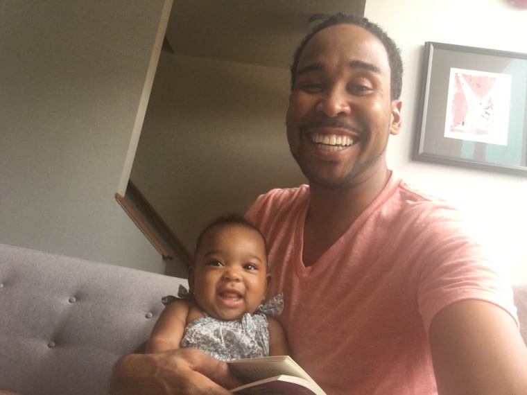 David Johns reads to niece