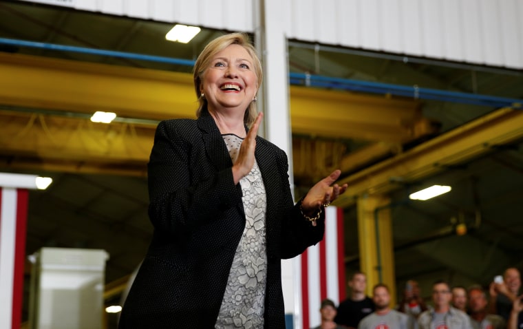 Image: U.S. Democratic presidential nominee Hillary Clinton smiles as she is introduced at Futuramic Tool & Engineering in Warren