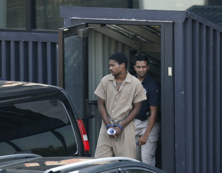 Emanuel Lutchman is transported out of a Federal Building on Thursday, Aug. 11, 2016, in Rochester, N.Y.