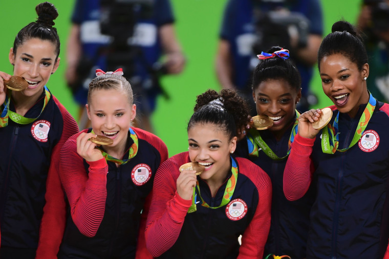 Team USA Gymnasts Pose With Gold Medals At Rio Olympics