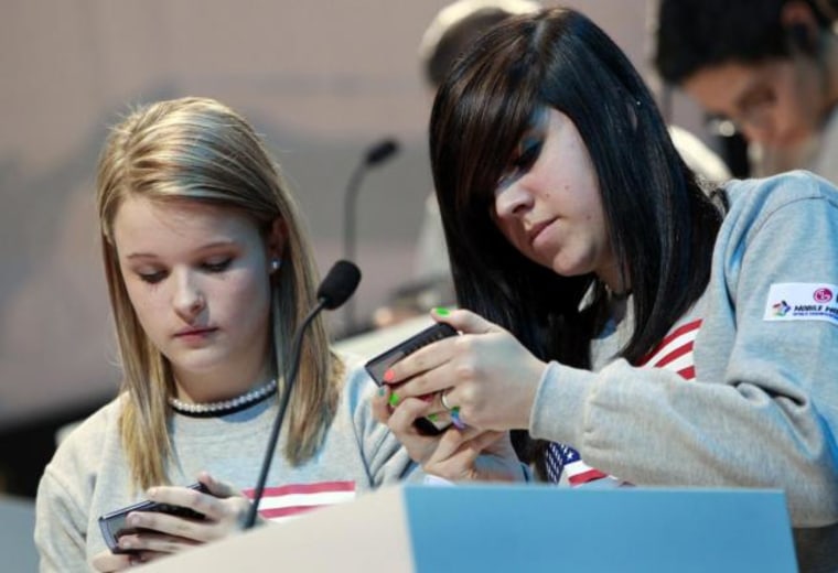 File photo of contestants competing in the the LG Mobile Worldcup Texting Championship in New York